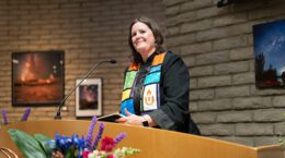 A picture of Reverend Christine at the pulpit during her installation ceremony