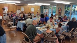 A group of UUCP folk enjoying a meal together.