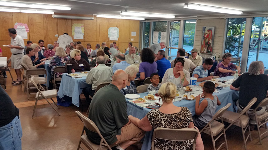 A group of UUCP folk enjoying a meal together.