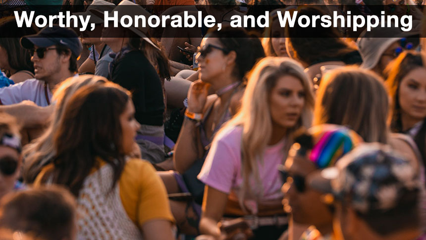 A group of people sitting at an event.