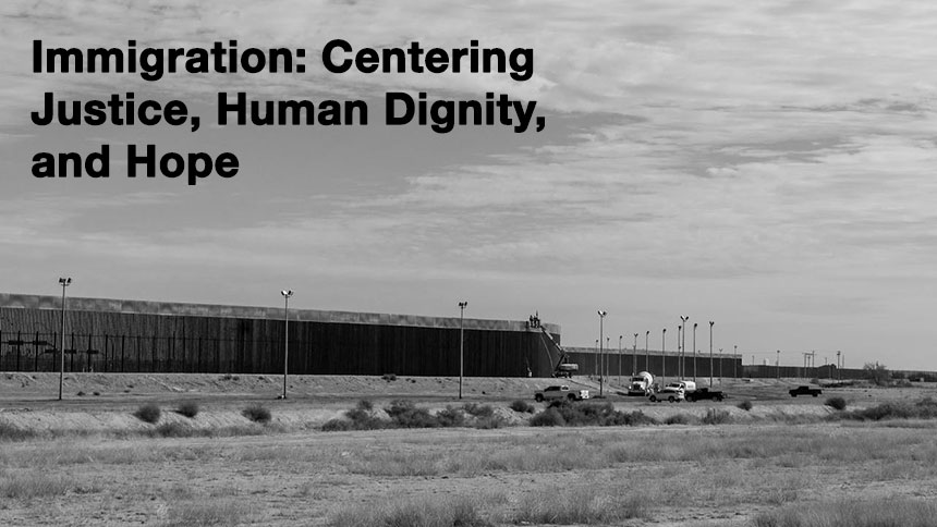 A black and white picture of the US - Mexico border.