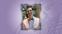 A picture of Daniel Froid in a picture frame with a gradient purple background